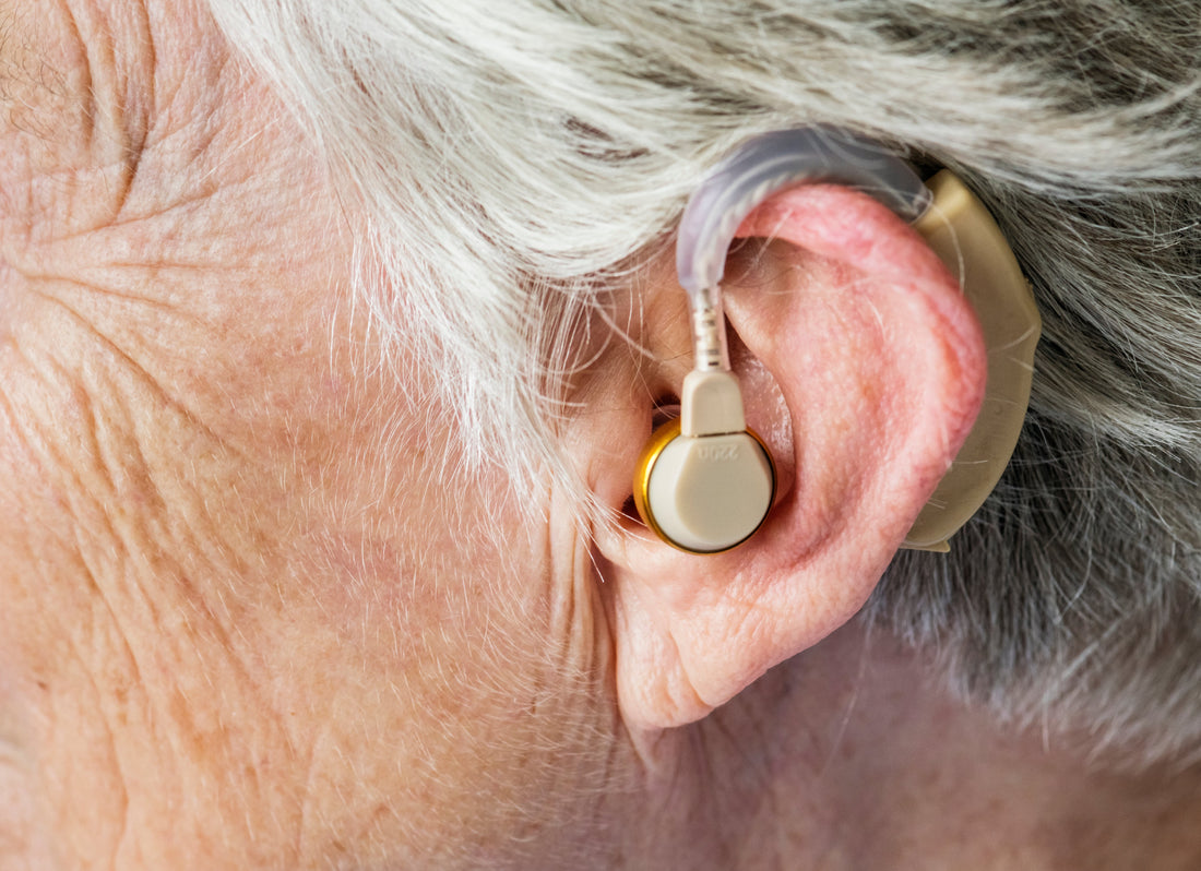 Why More Over-50s in the UK Are Choosing Zingle Hearing Amplifiers Over NHS Hearing Aids